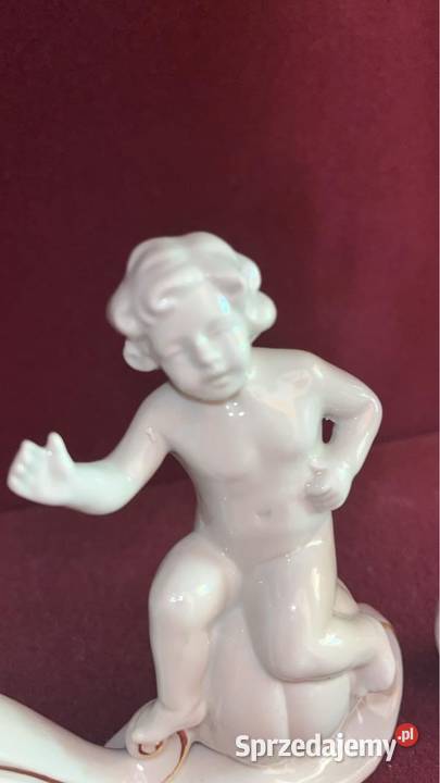 2Białe świeczniki z Putto lustrzane kominkowe Gdańsk