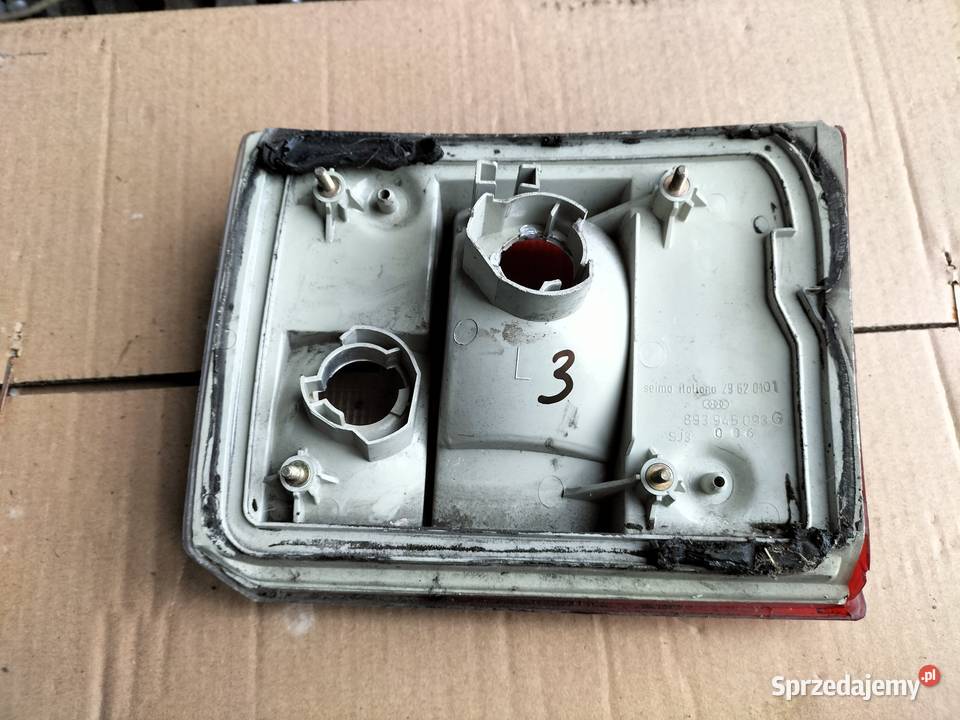 LAMPA TYŁ TYLNA LEWA Audi 80 LEFT 893945093G Oświetlenie Kamień-Kolonia sprzedam