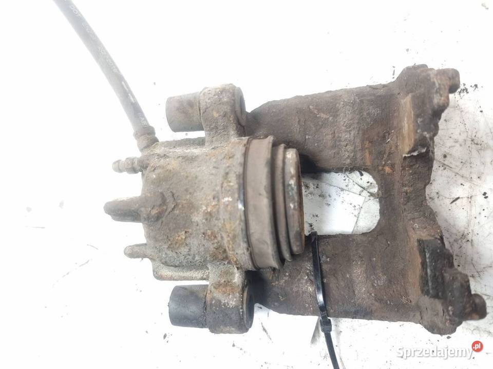ZACISK HAMULCOWY PRZÓD PRAWY FORD FOCUS MK1 Lipno