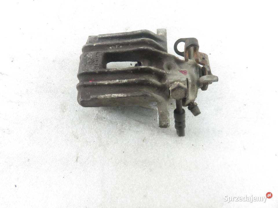 ZACISK PRAWY TYŁ SKODA FABIA I 14