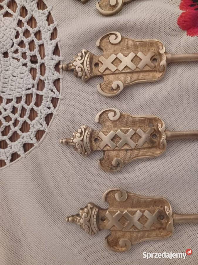 Piękny masywny wieszak mosiężny