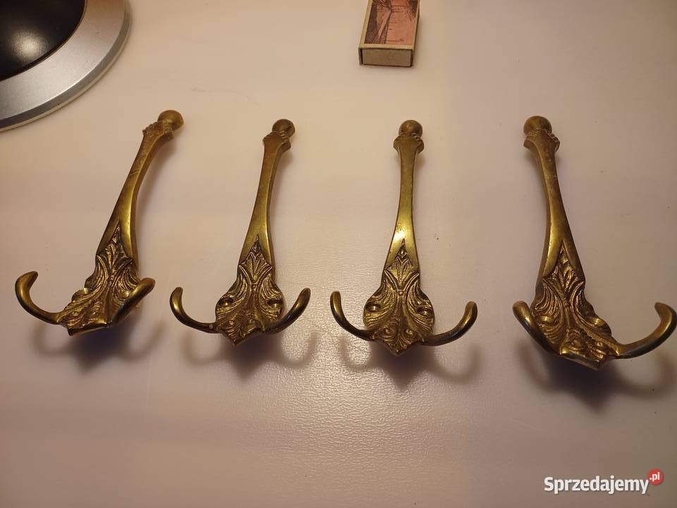 Komplet czterech dużych wieszaków Mosiądz Poznań