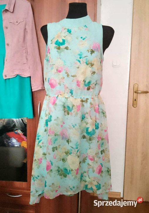 Sukienka asymetryczna w kwiaty miętowa Spódnice i sukienki Moda i Styl Chrzanów