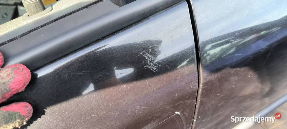 DRZWI LEWE PRZÓD OPEL ASTRA G Z298 osobowe Lipno