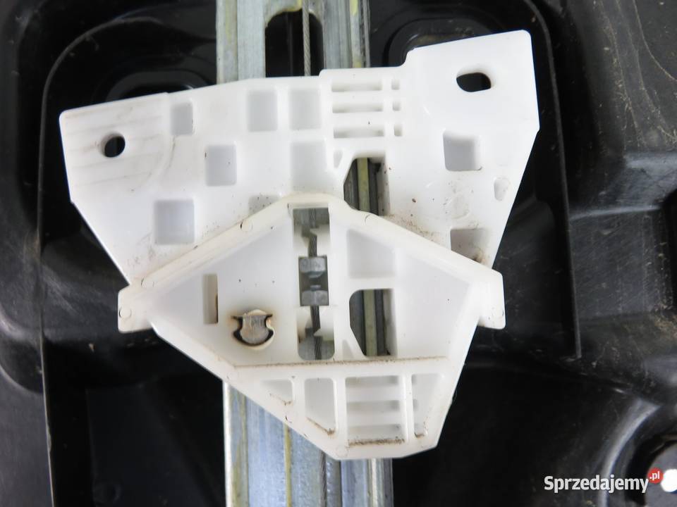 MECHANIZM SZYB LEWY TYL MAZDA II