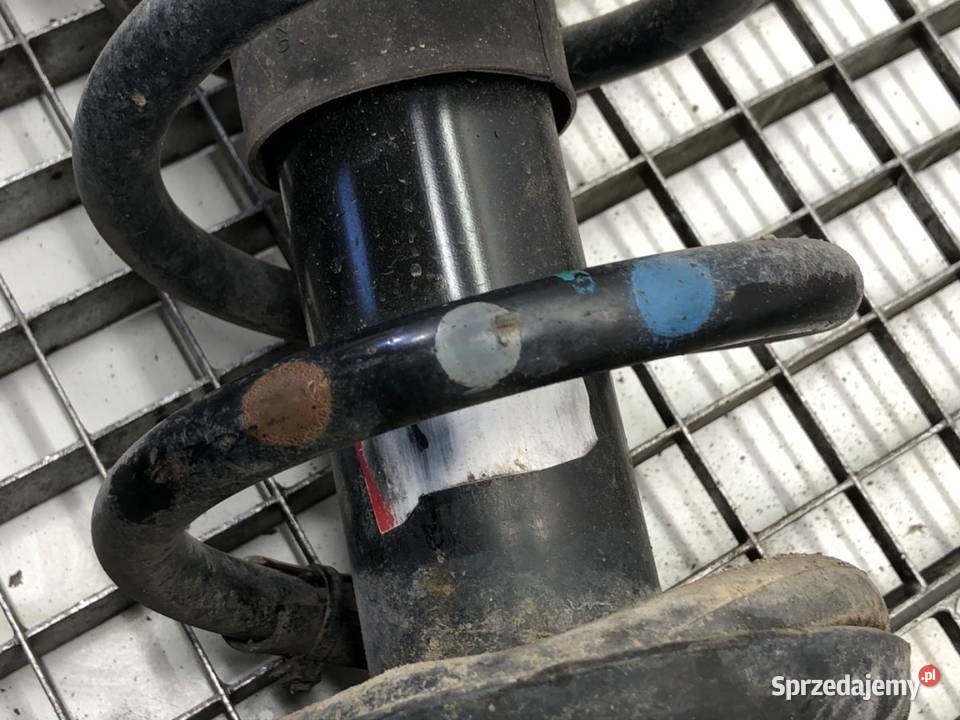 AMORTYZATOR PRAWY PRZÓD ZE SPRĘŻYNĄ RENAULT Amortyzatory