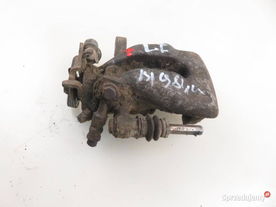 ZACISK LEWY TYŁ OPEL COMBO C 13 CDTI 16V Z 13