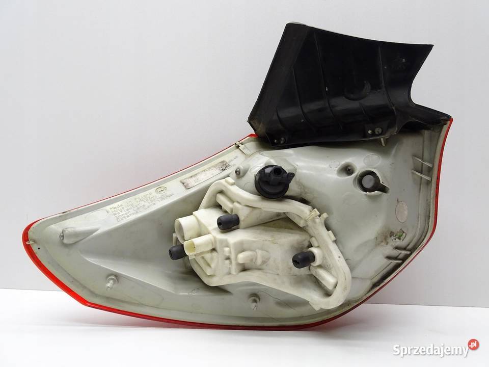 LAMPA PRAWY TYŁ PRAWA TYLNA W BŁOTNIK OPEL ASTRA