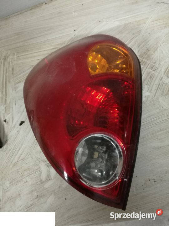 MITSUBISHI L200 2008 2009 LAMPA TYŁ LEWA Oświetlenie Kozubszczyzna