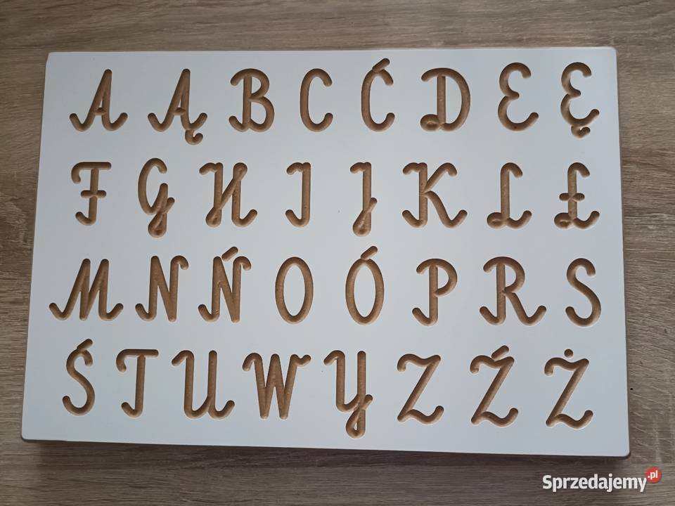 Drewniana tabliczka z alfabetem Kwidzyn