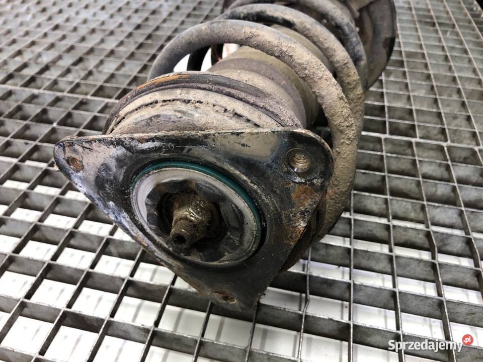 AMORTYZATOR LEWY PRZÓD ZE SPRĘŻYNĄ NISSAN osobowe Amortyzatory sprzedam