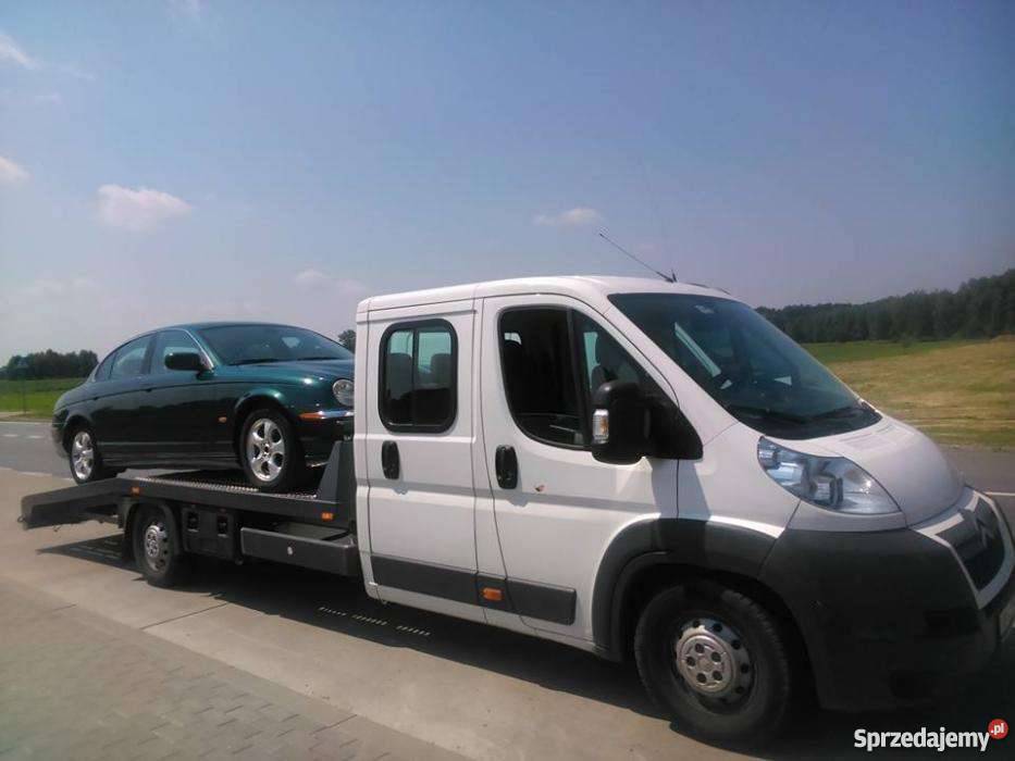 Przeprowadzki transport auto z windą Sulejówek