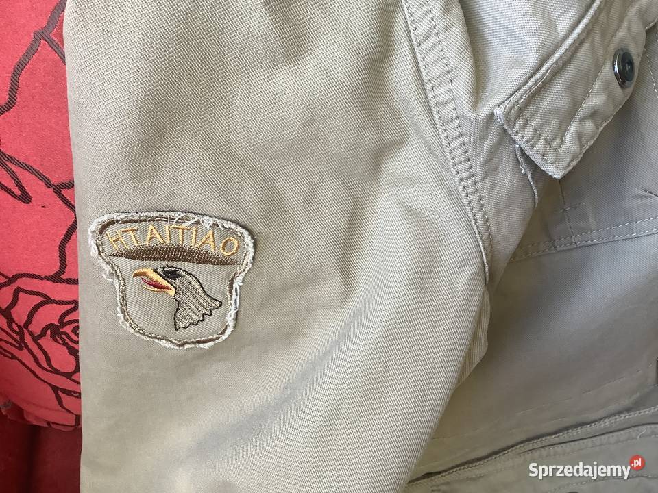 Kurtka meska ciepla z kapturem i z ciekawym Inny materiał sprzedam