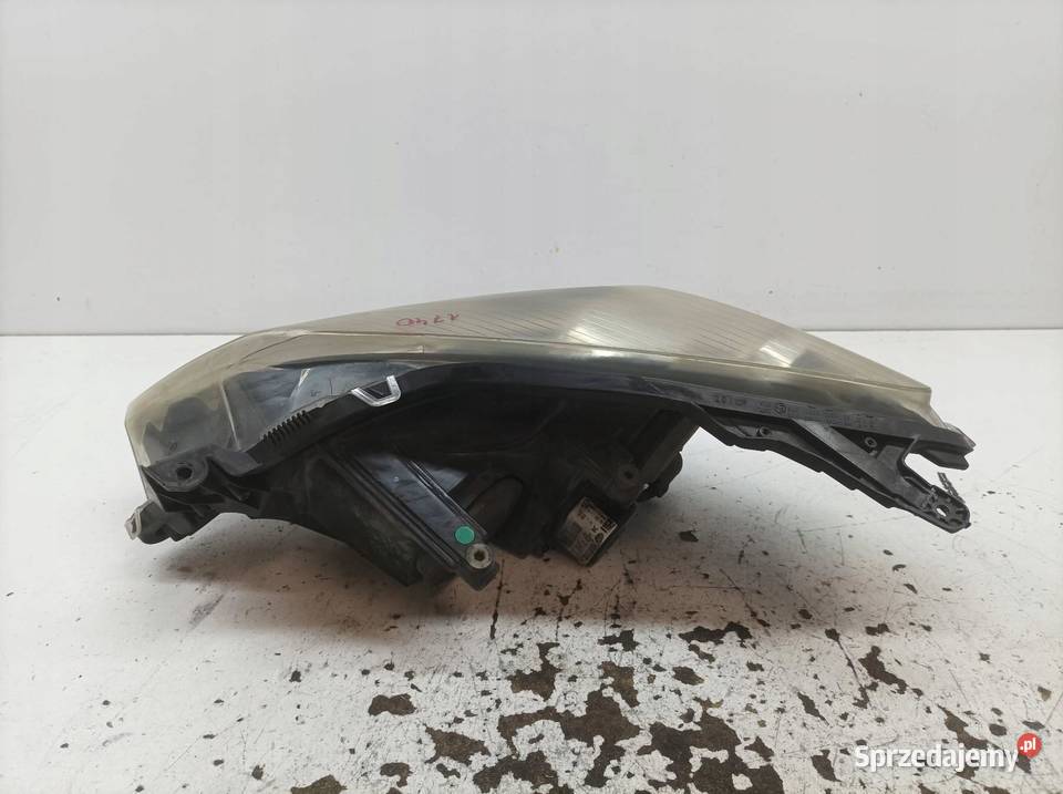 LAMPA PRZÓD PRAWA 24451033 1EG27037002 Opel Motoryzacja