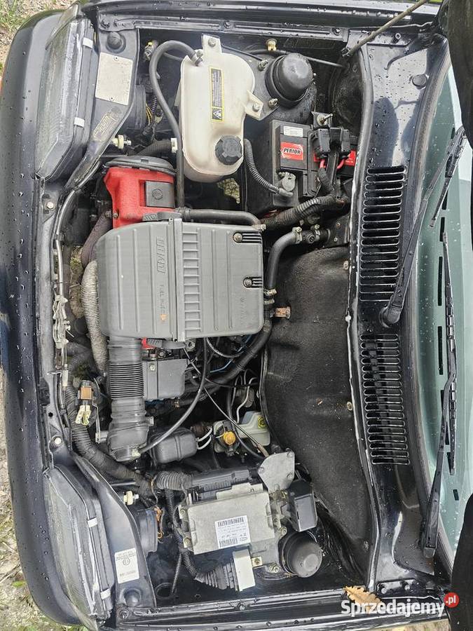 Cinquecento Sporting 11i Samochody osobowe