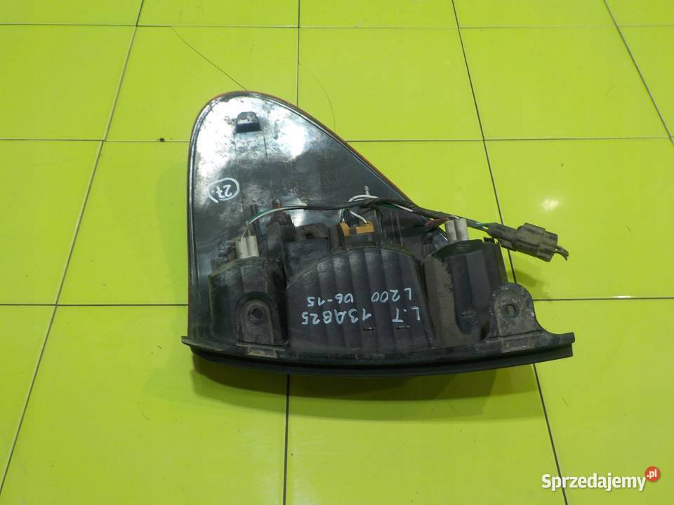 MITSUBISHI L200 IV 25 DID 06r 5D lampa lewa tyl osobowe mazowieckie Suków sprzedam