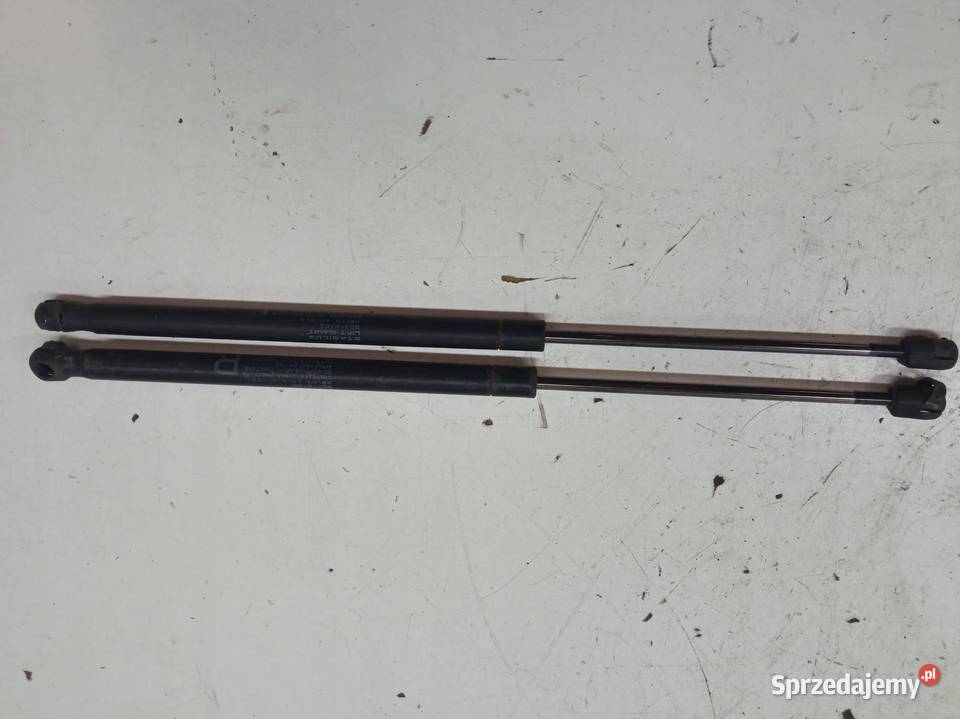 SIŁOWNIK KLAPY PRAWY LEWY TYŁ KPL 5802A303