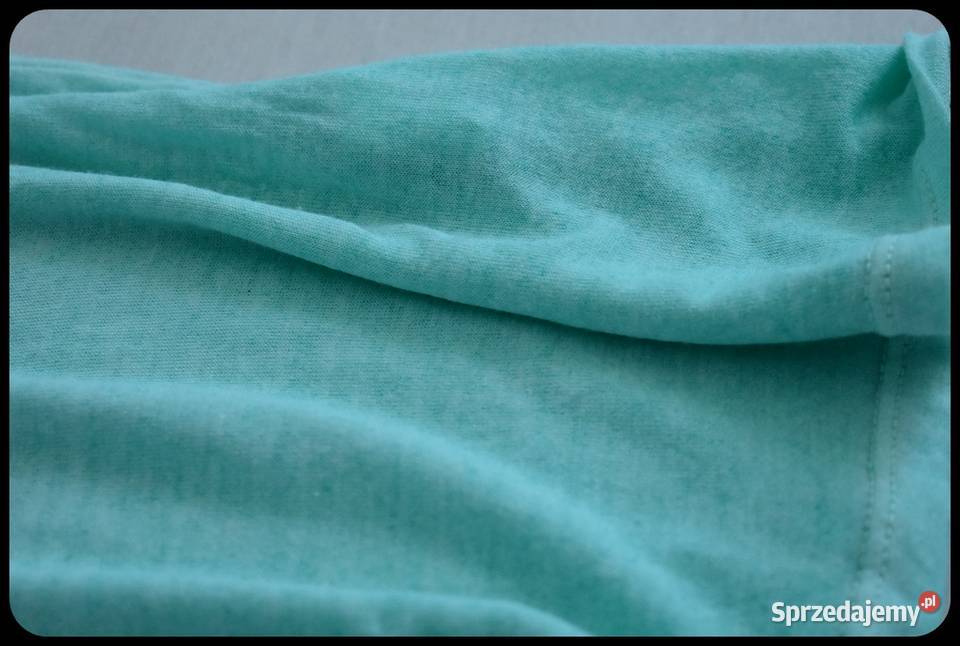 Miętowa bokserka mocno wycięta narzutka bluzka