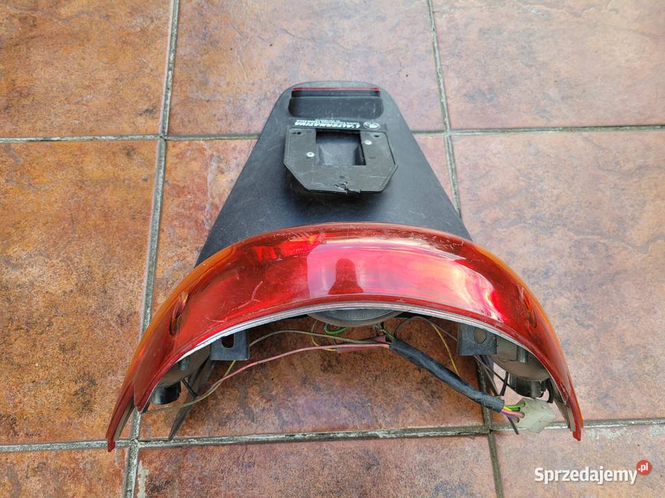 DERBI ATLANTIS lampa tyl tylnia blotnik komplet Piła