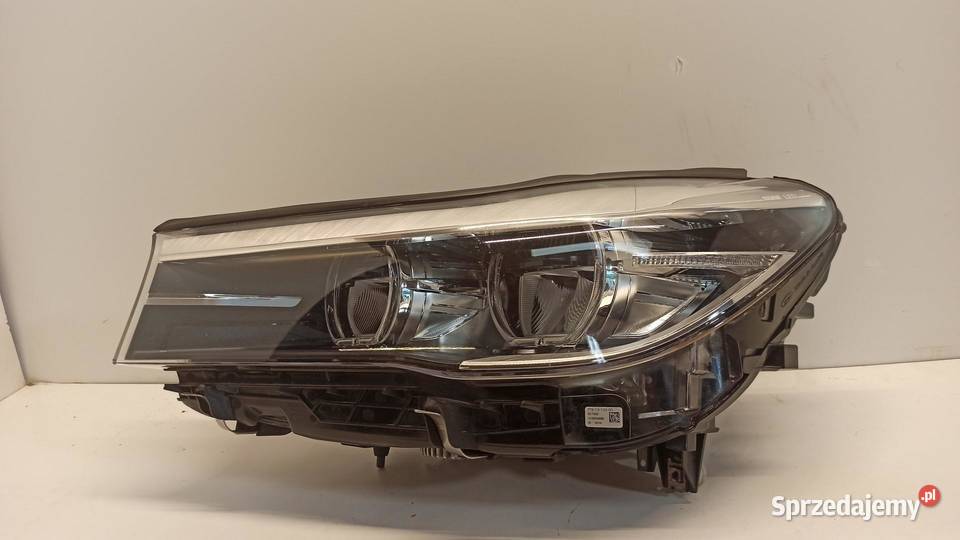 BMW 7 G11 LAMPA LEWY PRZÓD ANGLIK 7483897 RHD