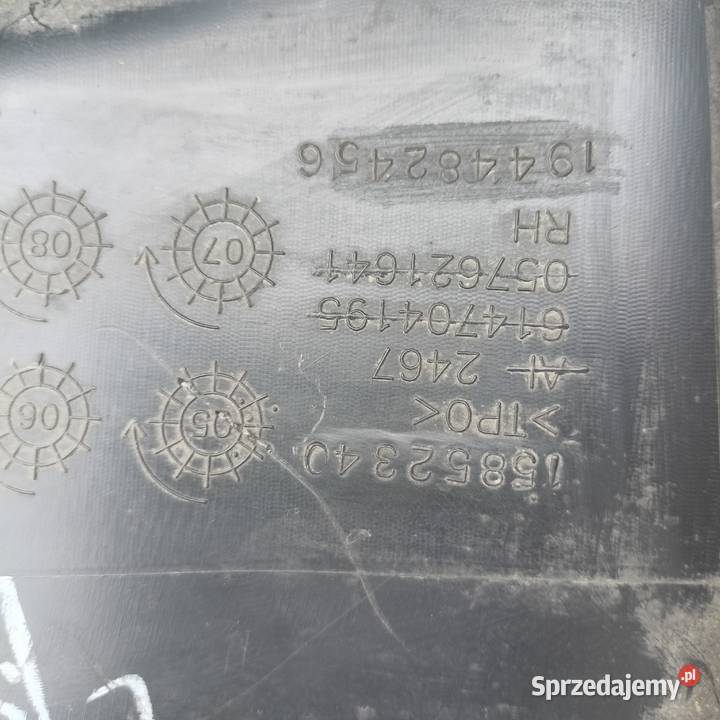 Cadillac SRX 15852340 przód prawa nakładka Rok produkcji 2008 Mietków