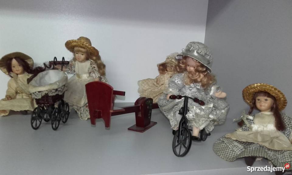 Zestaw porcelanowych lalek rower wózek huśtawka Ropczyce sprzedam