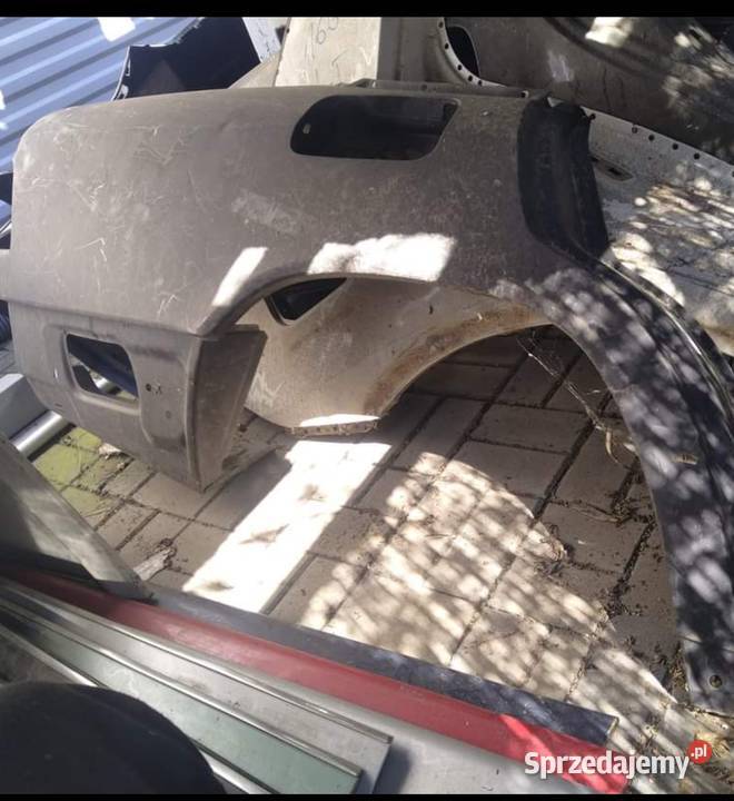 W124 prawy tylni błotnik nowy oryginalny sedan Karoseria Przeźmierowo