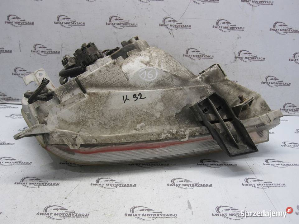 SUZUKI GRAND VITARA II 06r lampa lewa przód Lampy przednie