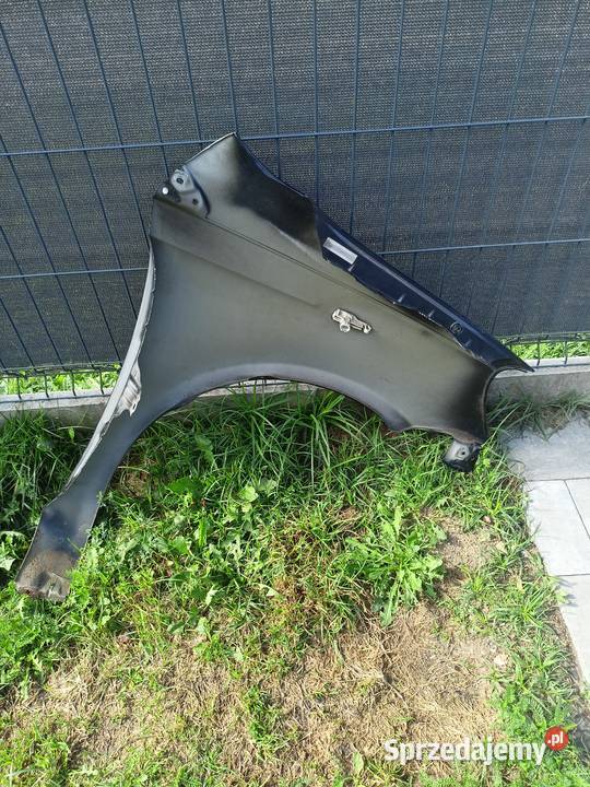 Błotnik prawy lewy Toyota Yaris P1 9905 kod