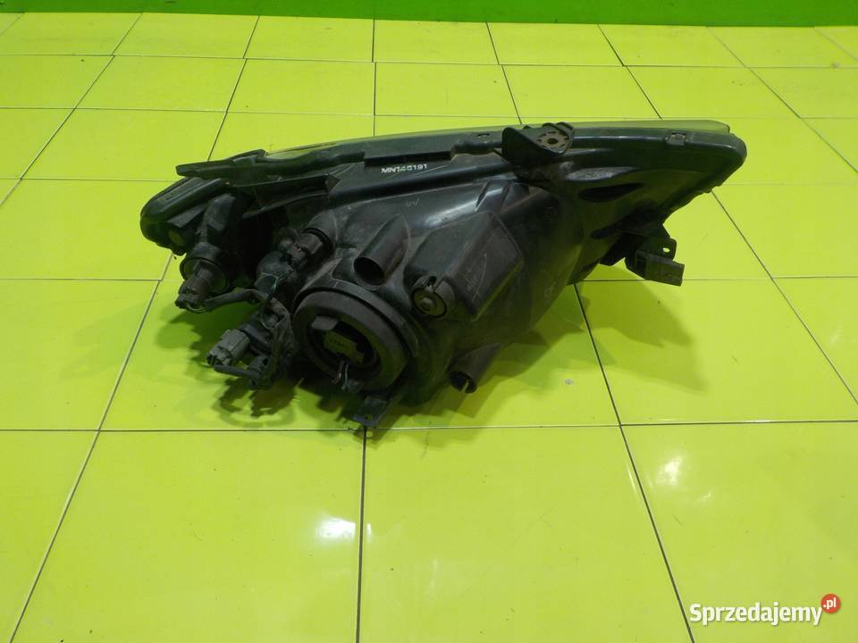 MITSUBISHI L200 IV 25 DID 06r 5D lampa lewa osobowe mazowieckie