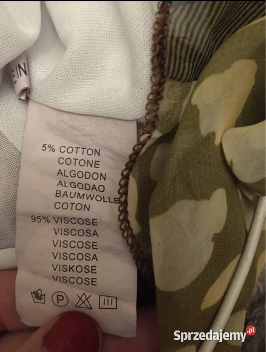 Kolorowa sukienka mgiełka z paskiem i aplikacją Kłodawa