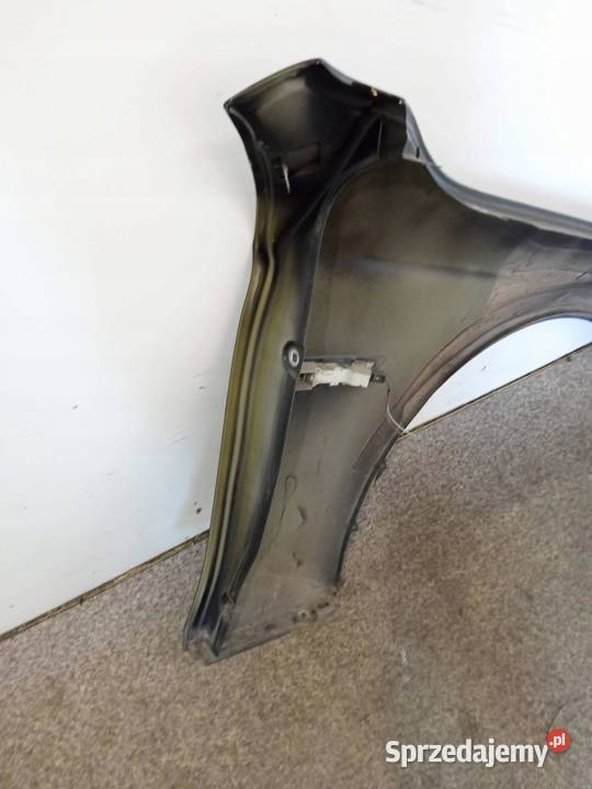 BŁOTNIK LEWY PRZÓD 668 Bmw Seria 5 VI 2010