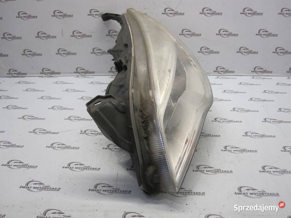 OPEL ASTRA J 10r lampa lewa przód 13253656