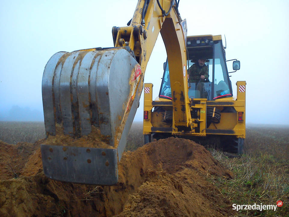 Usługi koparkoładowarką CAT Usługi transportowe mazowieckie Warszawa