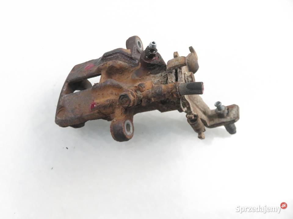 ZACISK LEWY TYŁ NISSAN ALMERA II N16 osobowe