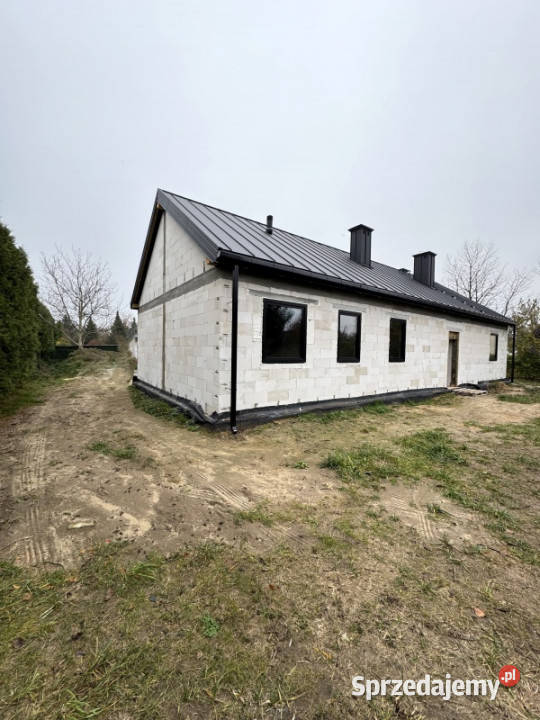 Dom budowany siebie nowoczesna bryła budynku Domy Dębe