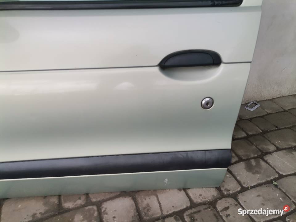 DRZWI LEWY PRZÓD RENAULT MEGANE 1 FL HB MV931 osobowe małopolskie Nowy Sącz