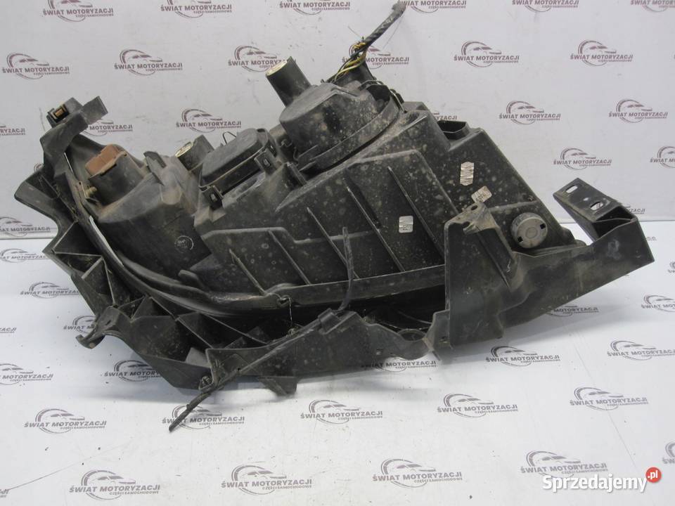 BMW E91 06r lampa lewa przód 6942723 ANGLIK osobowe Oświetlenie sprzedam