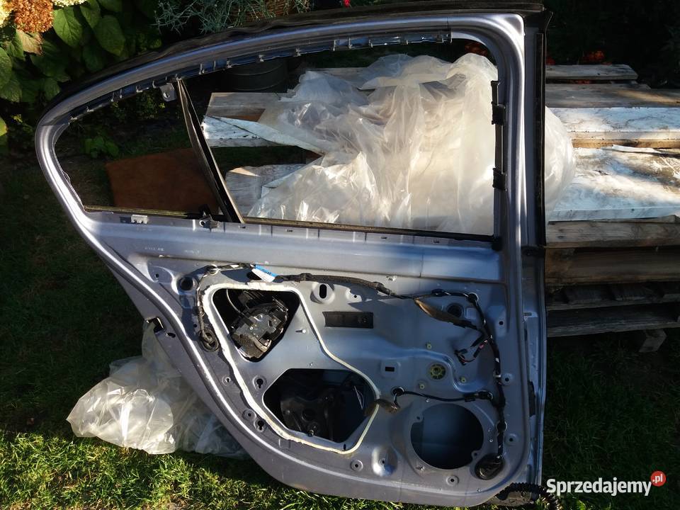 Drzwi lewy tył Renault Laguna III 07r Bełżyce