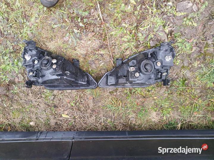 Lampa przednia reflektor prawa lewa Suzuki Liana osobowe