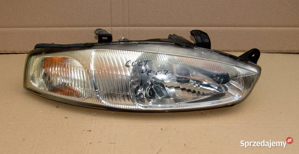 LAMPA PRZEDNIA LEWAPRAWA MITSUBISHI COLT V osobowe Motoryzacja Mysłaków