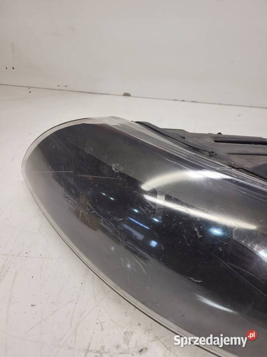 REFLEKTOR LEWY ZWYKŁY AUDI Q7 4L 4L0941003K UK Przystajń