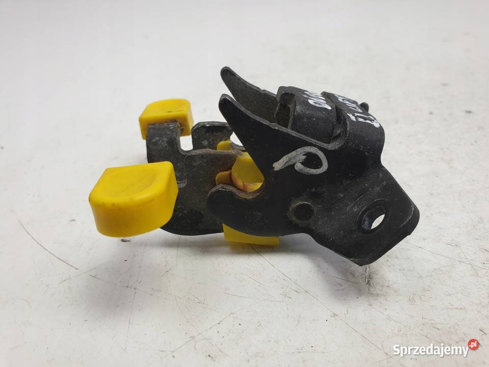 Fiat Doblo II lift PRAWY OGRANICZNIK DRZWI tył Rudka