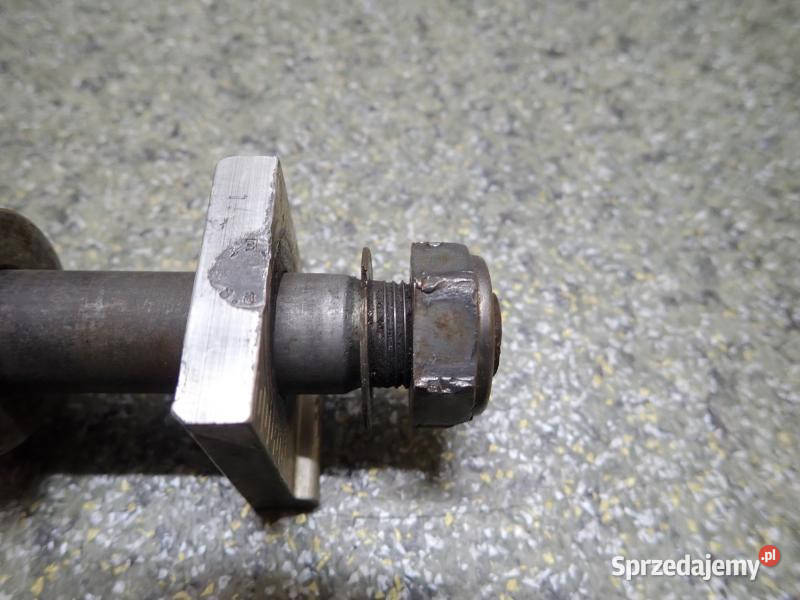 OŚ OŚKA 20MM KOŁA TYŁ DYSTANSE KOŚCI NAPINACZA
