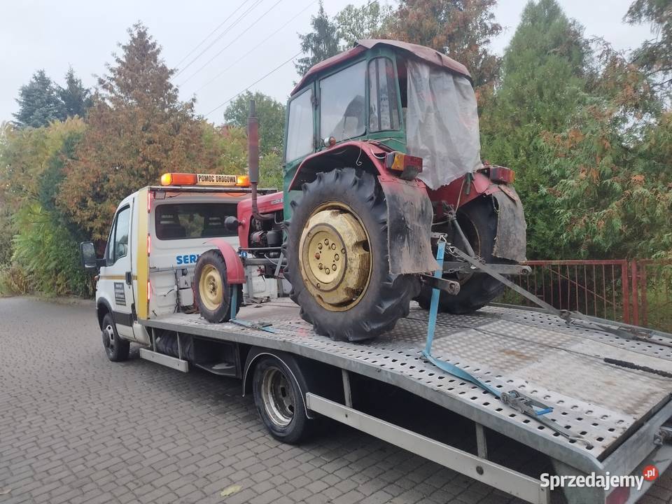 Auto pomoc laweta auto laweta transport Pomoc drogowa i holowanie usługi moto