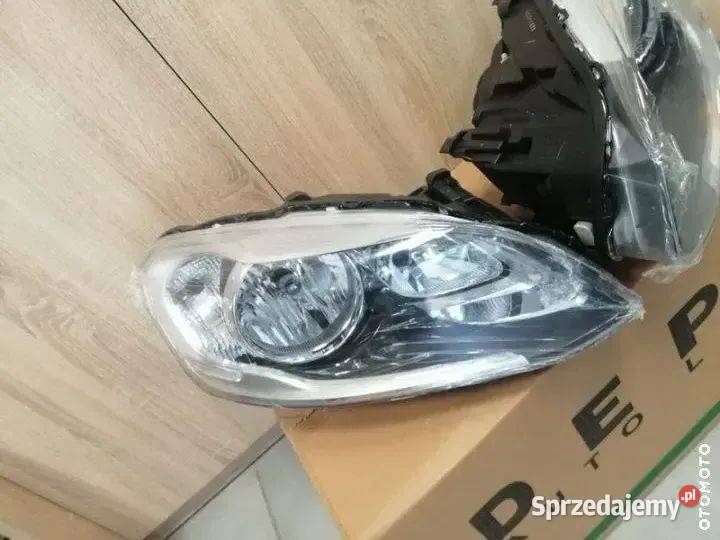 Volvo xc60 I lift reflektor przod nowy OEM Motycz