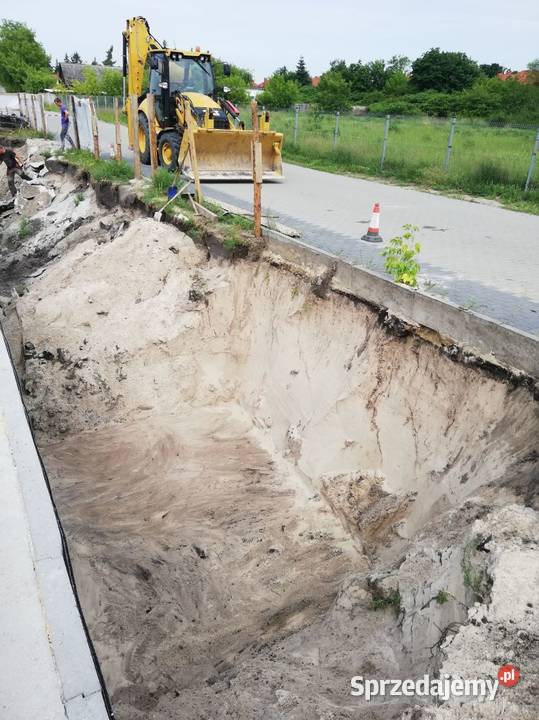 Usługi koparko ładowarką rozładunek tira