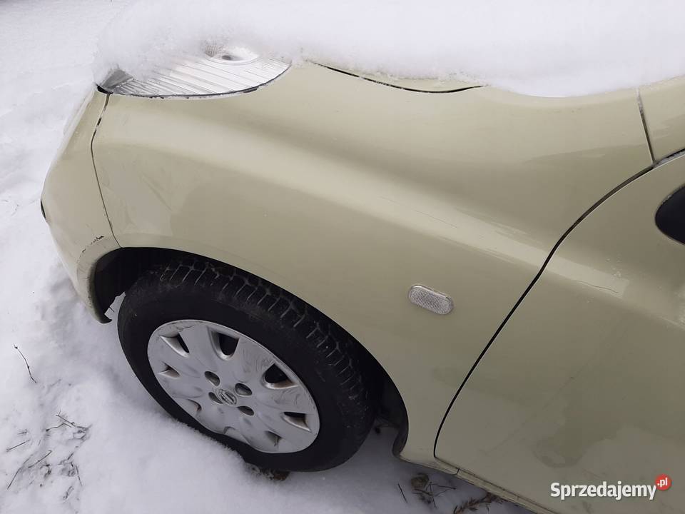 BŁOTNIK LEWY PRZÓD NISSAN MICRA K12 HATCHBACK 03 osobowe Nowy Tomyśl