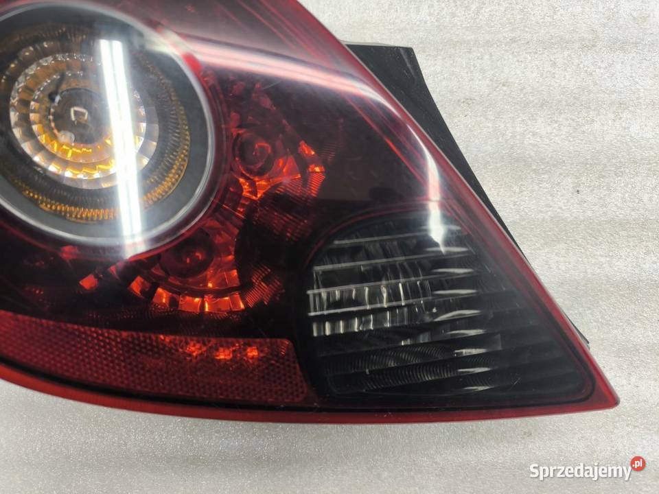 LAMPA LEWY TYŁ 3D OPEL CORSA D LIFT 13242813 osobowe Lampy cofania