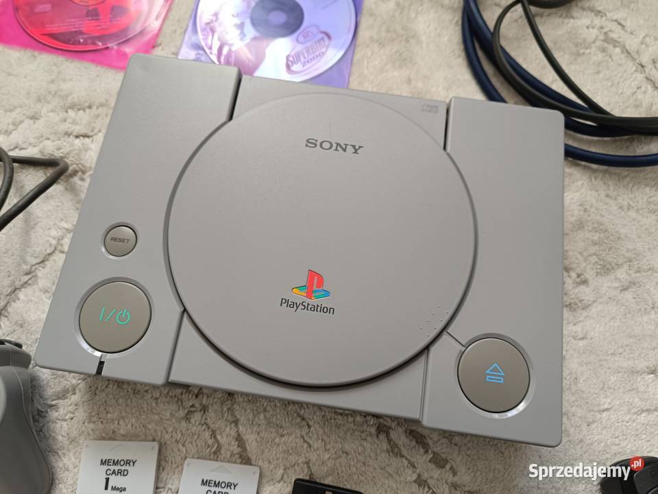 PlayStation 1 SCPH7002 2 pady 2 gry 2 karty Pruszków